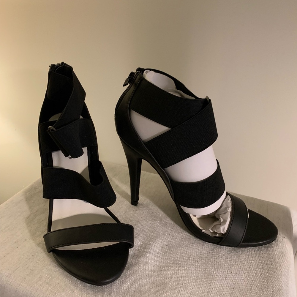 BLACK STILLETO STRAPPY SEXY SHOE. ZIPPER BACK.  ELASTIC STRAPS IN MIDDLE ,ankle
